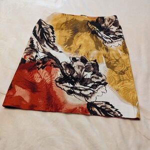 Nie & Zoe cotton Spandex Skirt. Floral Pattern. Yellow, brown, cream, orange .